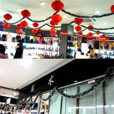 Girlanda poinsecji 2 m – dekoracja świąteczna na choinkę, stół i kominek