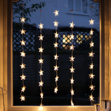 Luces de Cortina Estrella LED – Decoración Navideña Interior con Brillo Cálido y Elegante