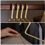 Juego de 5 Perchas Metálicas Elegantes