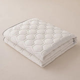 Protector de colchón transpirable y refrescante