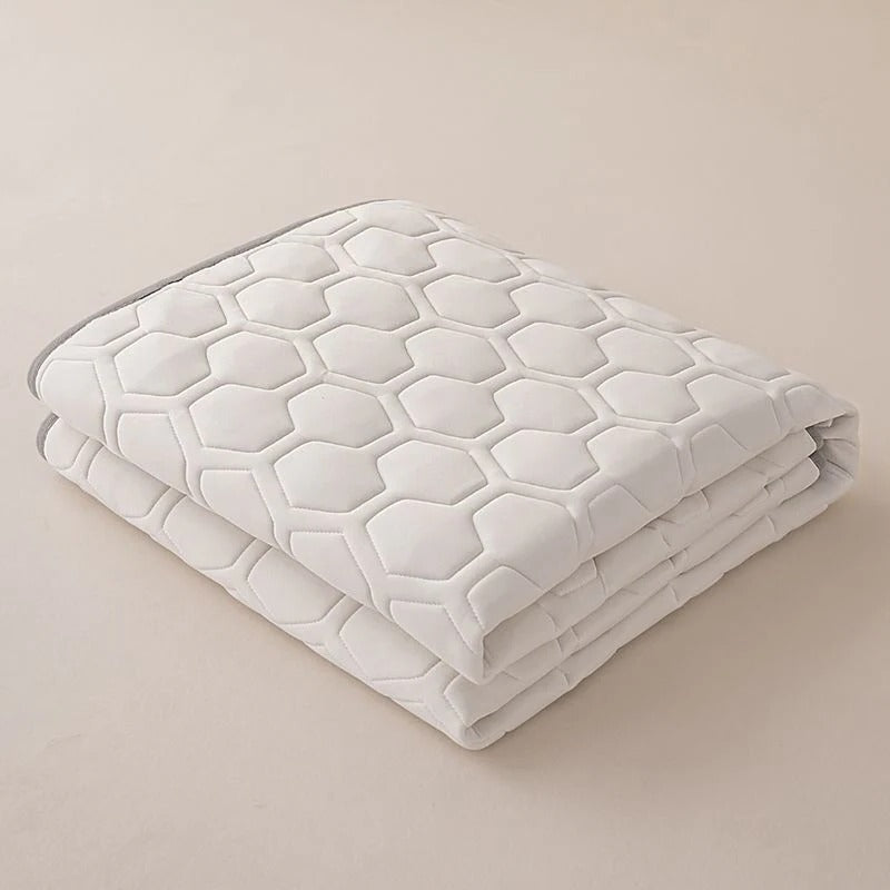 Protector de colchón transpirable y refrescante