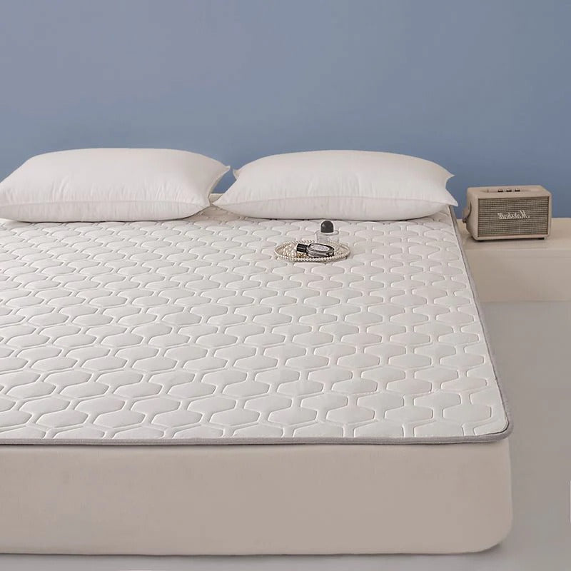 Protector de colchón transpirable y refrescante